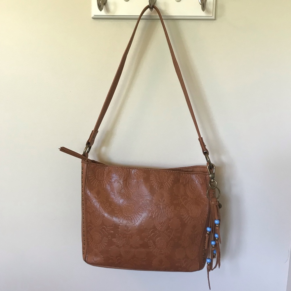 The Sak brand embossed leather handbag